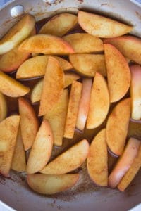 Cooked cinnamon apples in skillet
