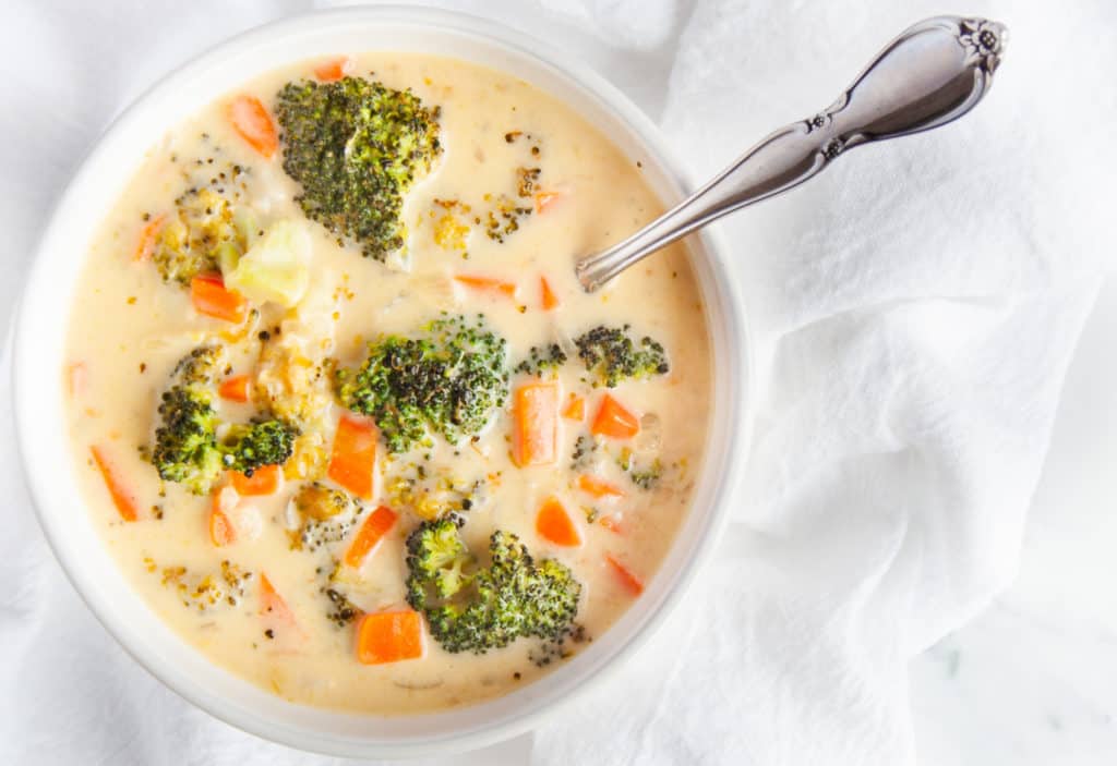 White bowl of Roasted Broccoli Cheddar Soup