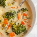 White bowl of Roasted Broccoli Cheddar Soup