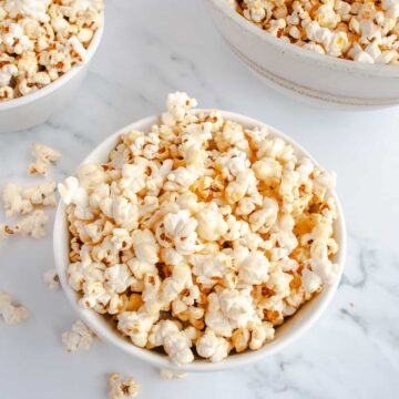 White bowls filled with Homemade Kettle Corn