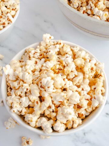 White bowls filled with Homemade Kettle Corn
