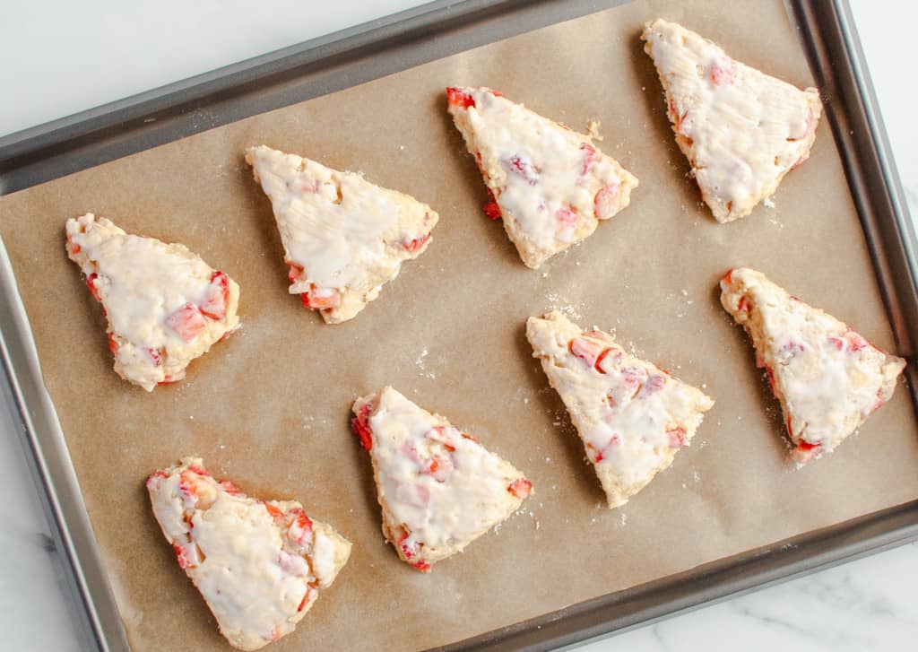 Strawberry Scones on parchment lined baking sheet