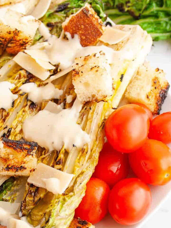 Grilled Caesar Salad with parmesan, croutons and grape tomatoes