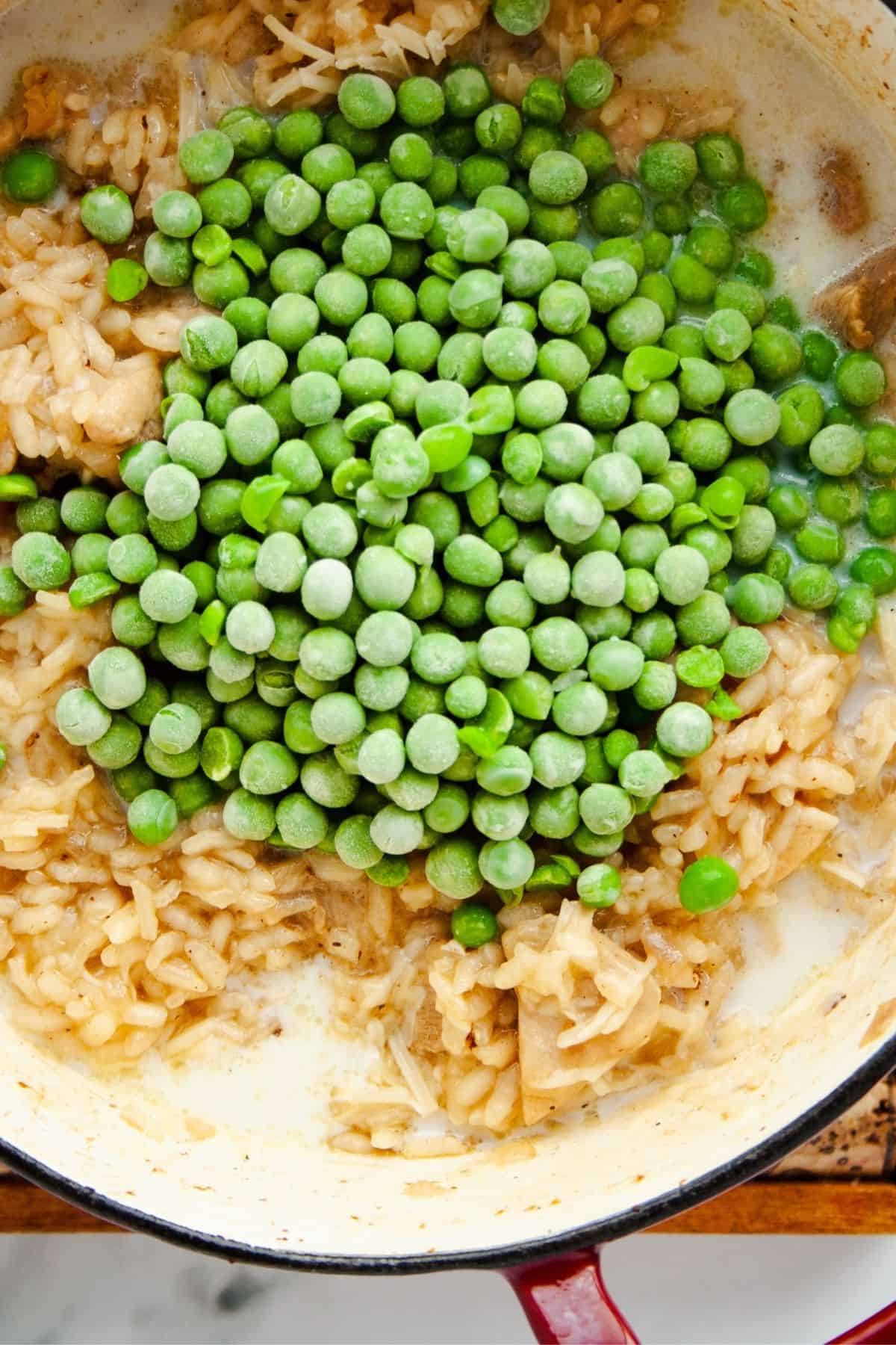 Frozen peas added to the risotto