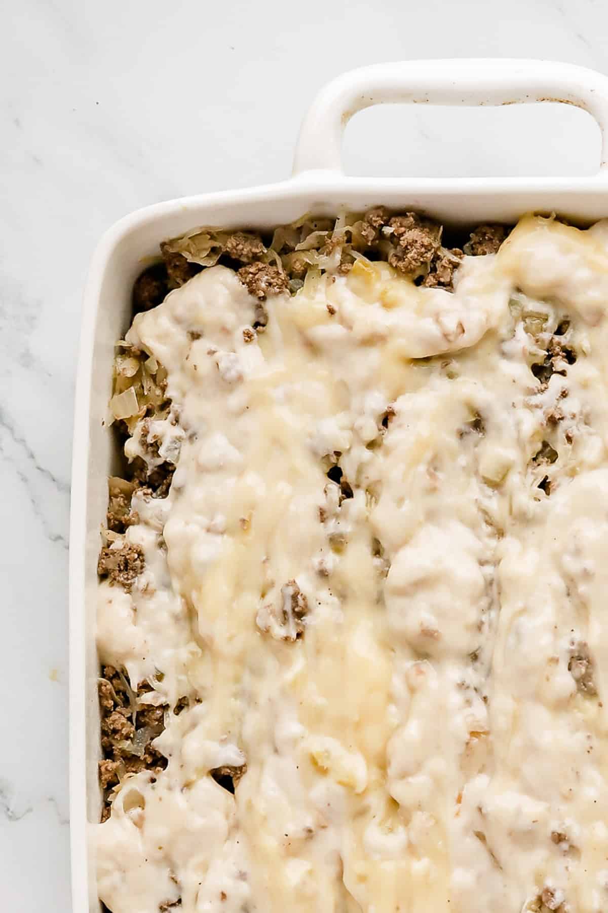 Cream soups spread over the top of the casserole.