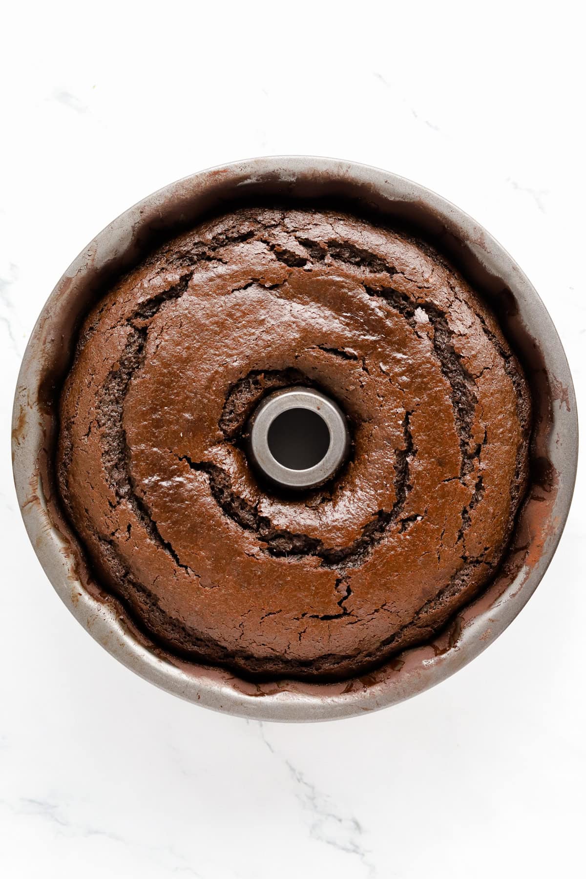 Baked chocolate mayo cake in bundt pan.
