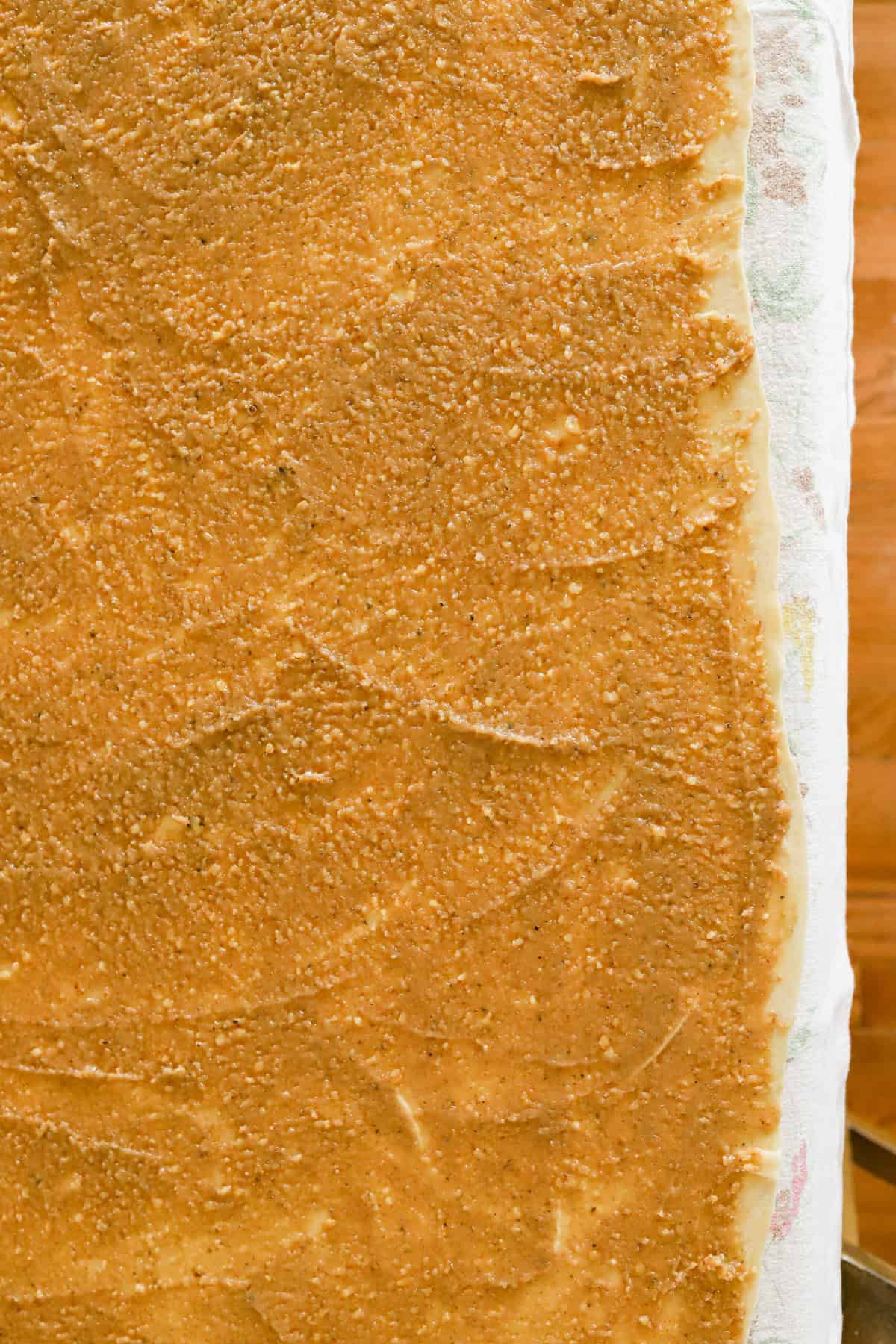 Walnut honey filling thinly spread over stretched dough.