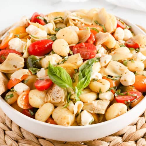 Featured image of italian gnocchi salad in a white dish.