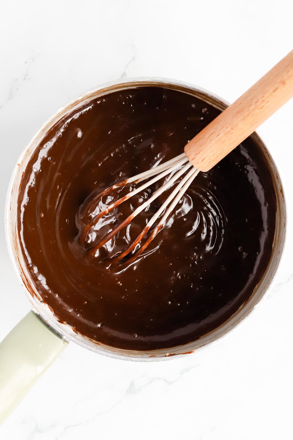 Saucepan of finished hot fudge sundae sauce