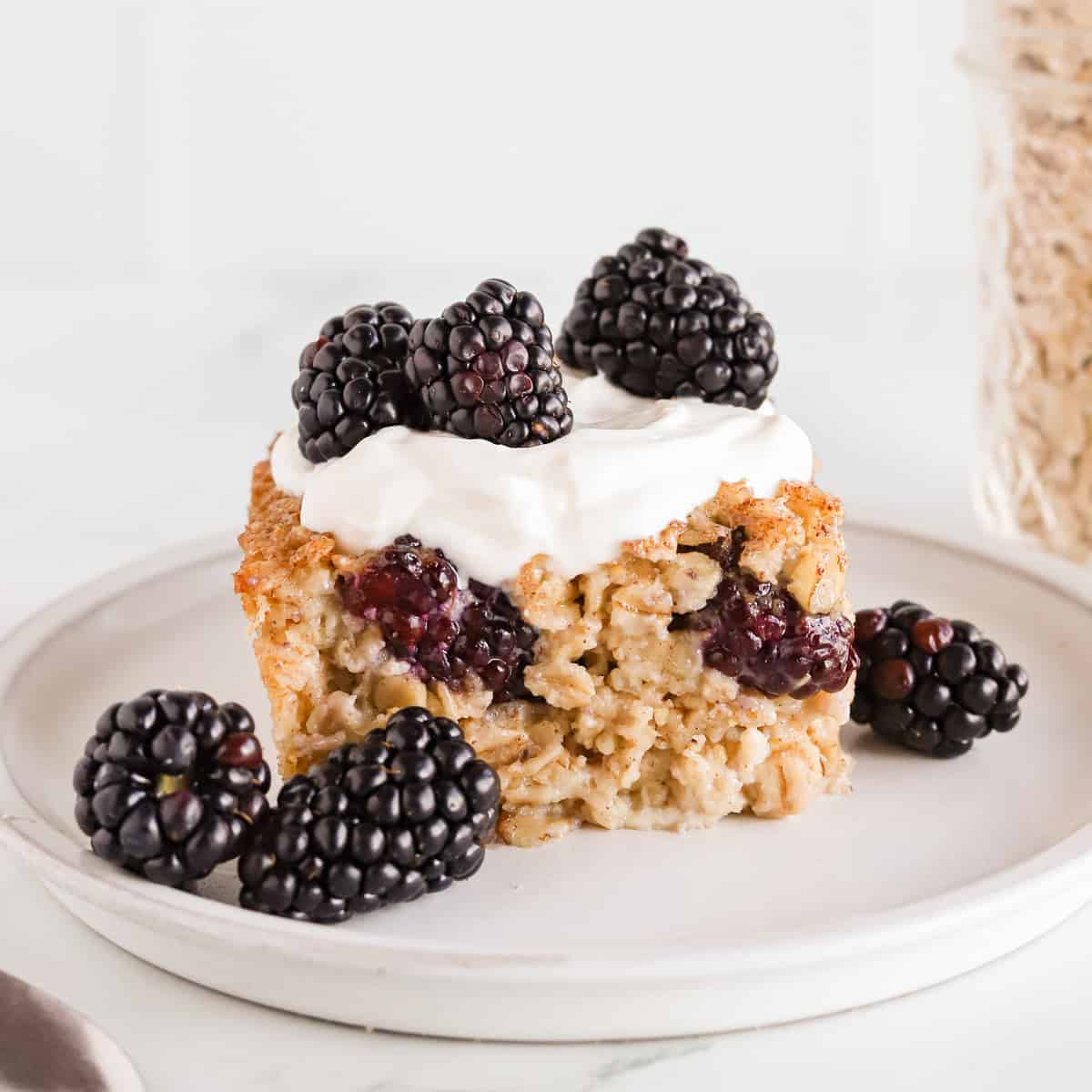 Featured image of plated blackberry oatmeal.