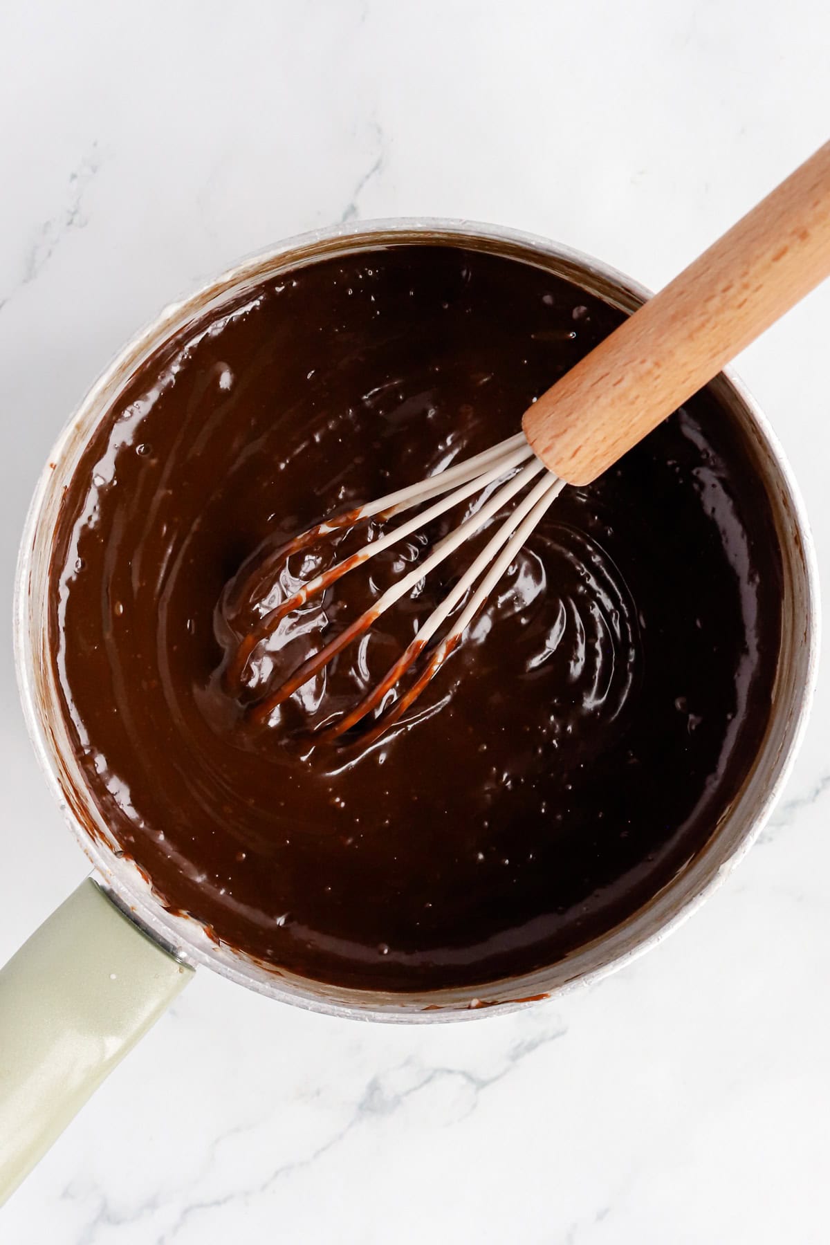 Saucepan of finished hot fudge sundae sauce