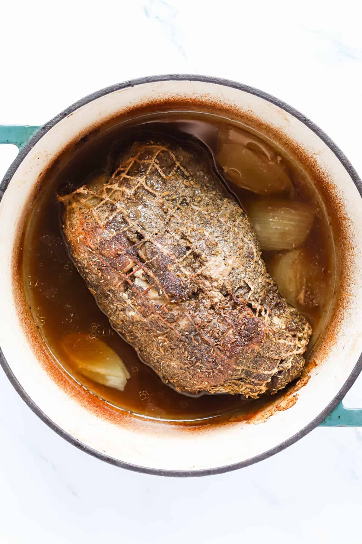 Roasted porketta in dutch oven.